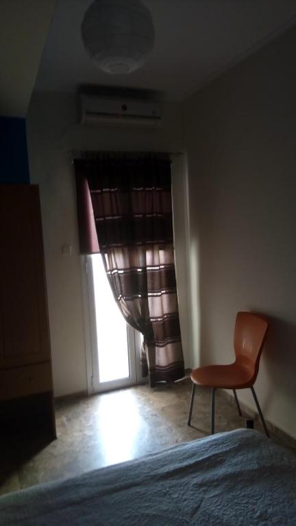 Postel nebo postele na pokoji v ubytování John Galouzis Studios