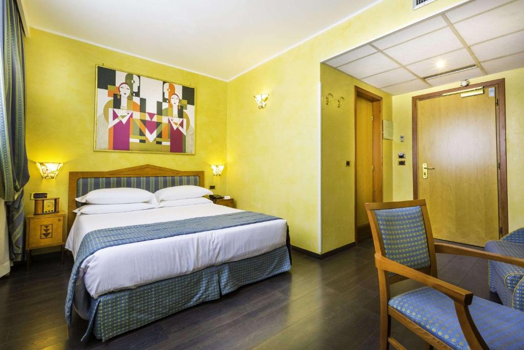 Postel nebo postele na pokoji v ubytování Best Western Hotel Artdeco
