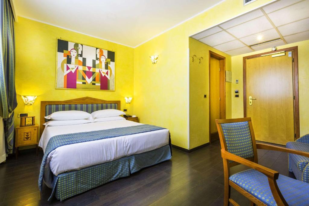 Postel nebo postele na pokoji v ubytování Best Western Hotel Artdeco