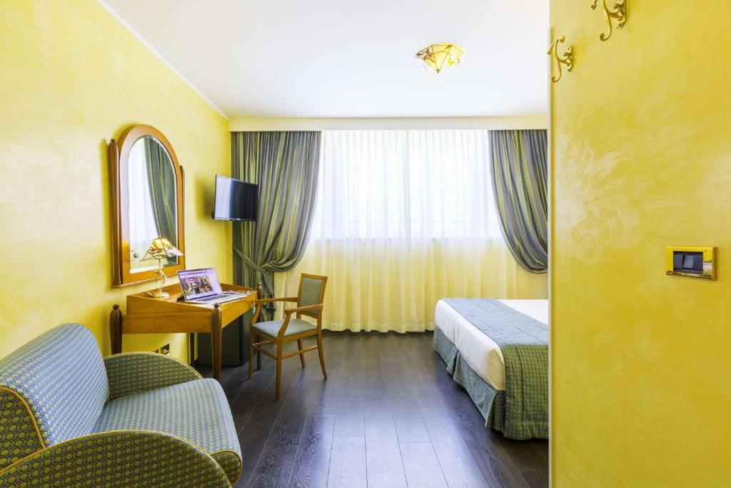 Postel nebo postele na pokoji v ubytování Best Western Hotel Artdeco