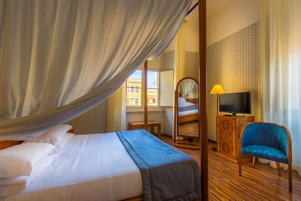 Postel nebo postele na pokoji v ubytování Best Western Hotel Artdeco