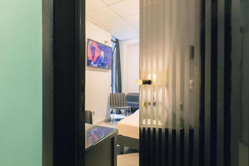 TV a/nebo společenská místnost v ubytování Executive Business Hotel