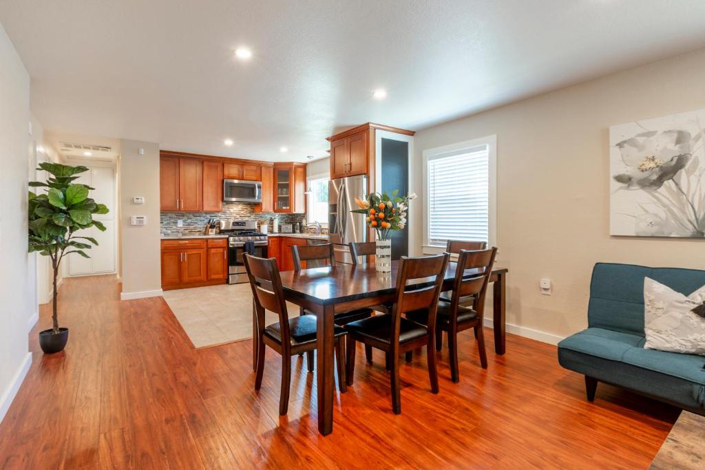 a kitchen and dining room with a table and chairs at @ Marbella Lane 3BR Upper Level House in Downtown San Jose in San Jose