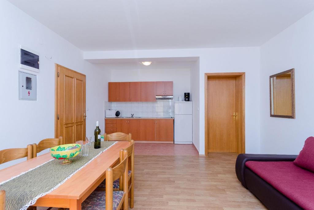 Kuchyňa alebo kuchynka v ubytovaní Apartments Alex