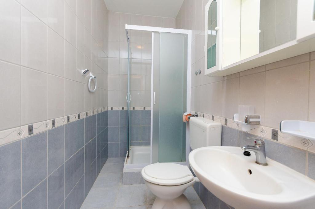Kúpeľňa v ubytovaní Apartments Alex