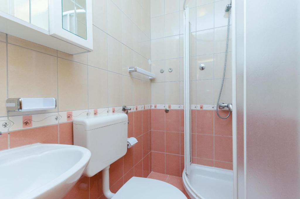 Kúpeľňa v ubytovaní Apartments Alex
