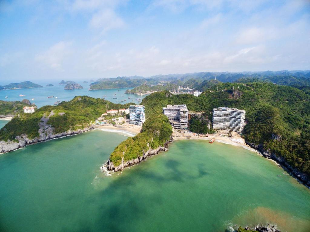 an aerial view of an island in the ocean at Flamingo Premium Cat Ba Beach Resort in Cat Ba