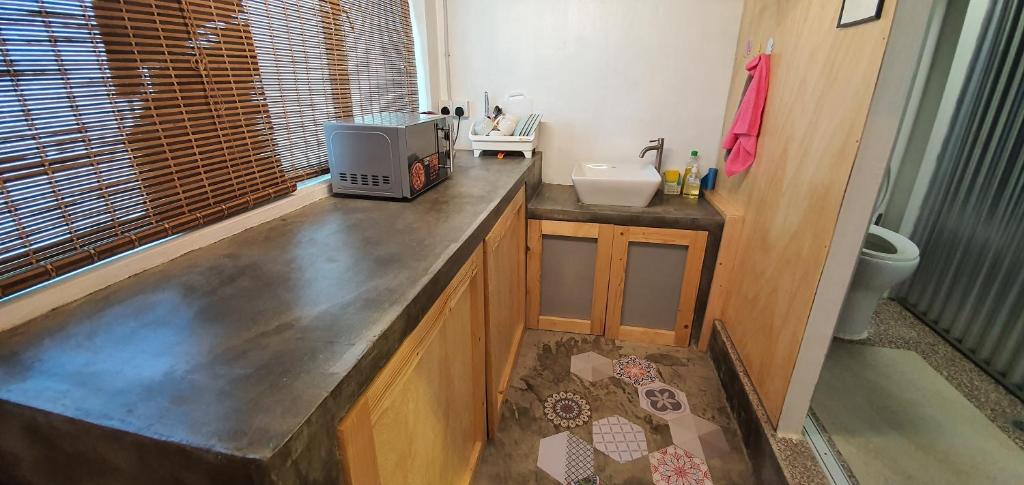 Kuchyň nebo kuchyňský kout v ubytování Tiny Home