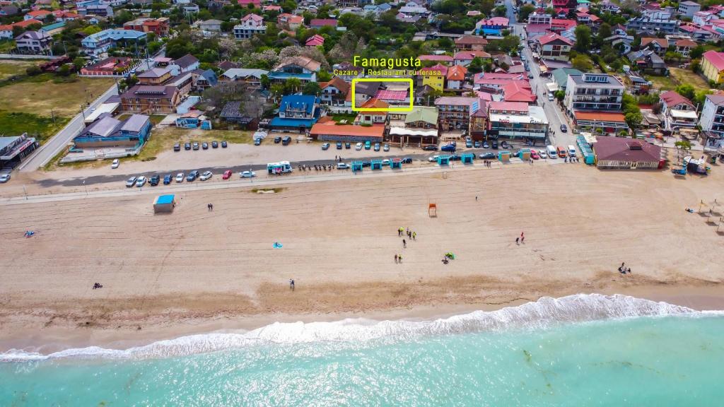 an aerial view of a beach with a crowd of people at Famagusta in Vama Veche