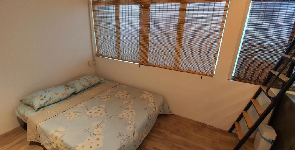 Postel nebo postele na pokoji v ubytování Tiny Home