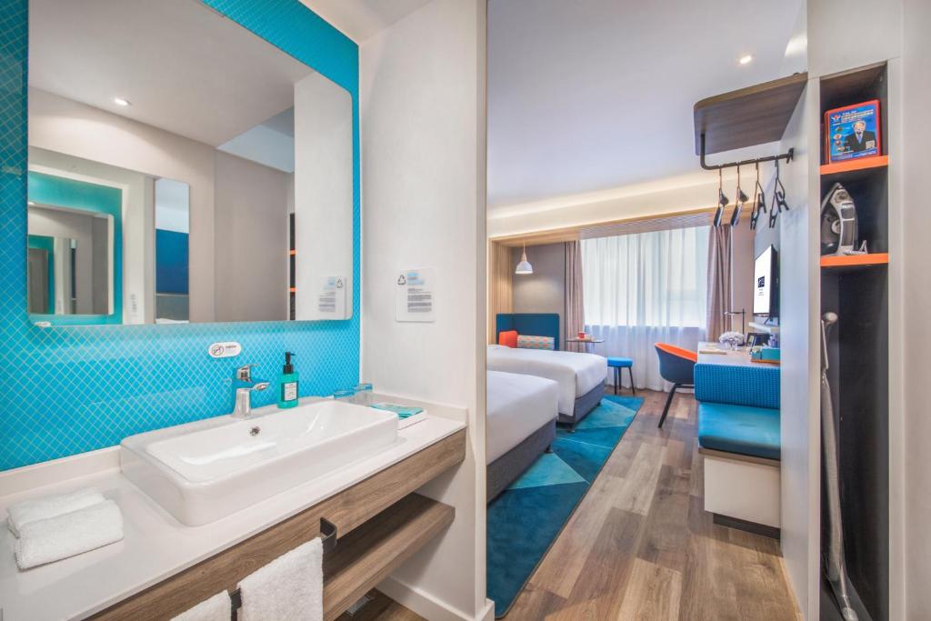 Postel nebo postele na pokoji v ubytování Holiday Inn Express Shanghai Jiading Center by IHG