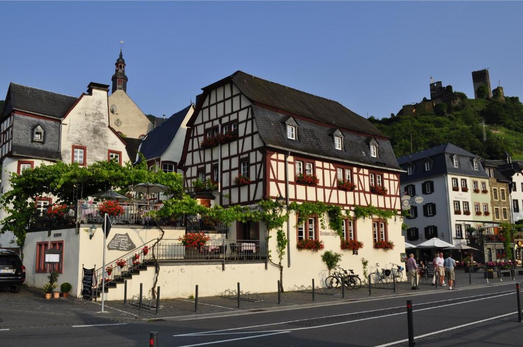 a group of buildings on the side of a street at Altes Zollhaus in Beilstein