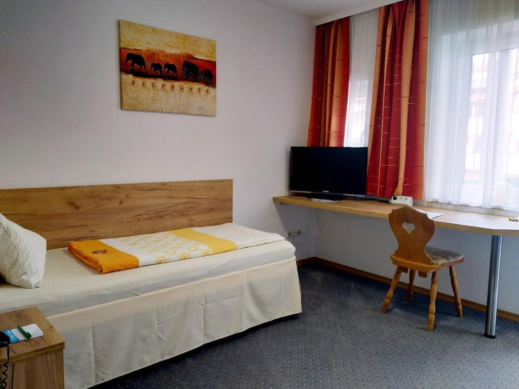 TV a/nebo společenská místnost v ubytování Hotel Fortuna