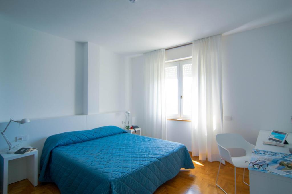 Posteľ alebo postele v izbe v ubytovaní Hotel Mistral