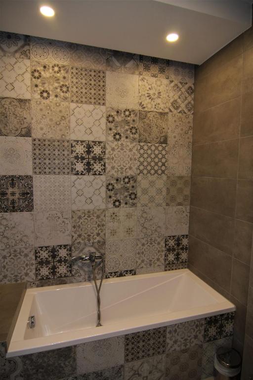 Koupelna v ubytování Vácz Hotel