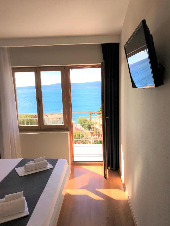 TV a/nebo společenská místnost v ubytování Berulia accommodation