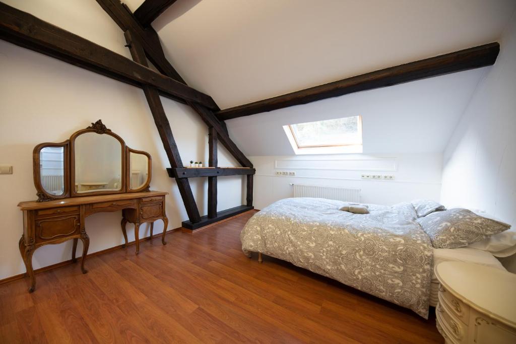 Postel nebo postele na pokoji v ubytování Burer Millen, Born Mühle