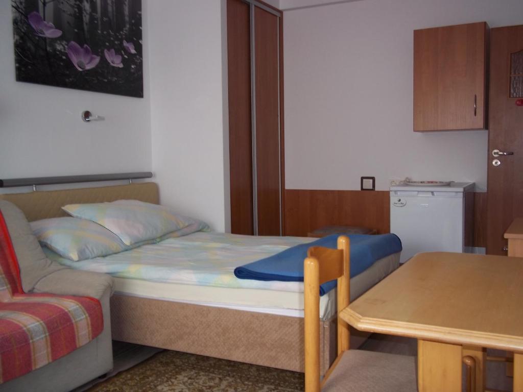 Posteľ alebo postele v izbe v ubytovaní Pokoje Gościnne Dąbrowscy