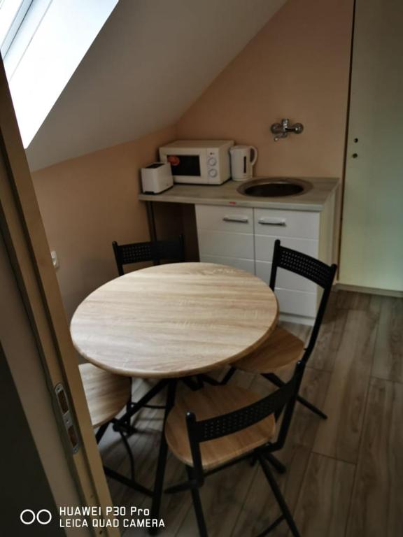 Kuchyň nebo kuchyňský kout v ubytování Renáta Apartman