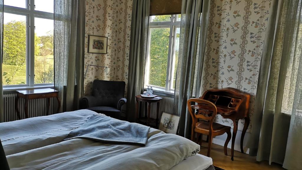 Postel nebo postele na pokoji v ubytování Hoby Gård B&B