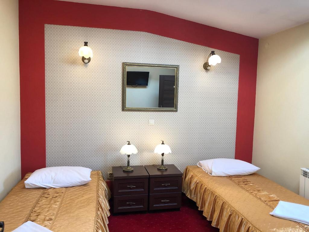 Posteľ alebo postele v izbe v ubytovaní Hotel Sekwana