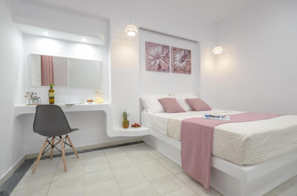 Łóżko lub łóżka w pokoju w obiekcie Jardin De Castillo , Naxos Town