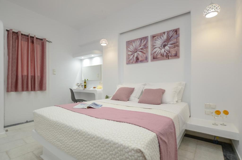Łóżko lub łóżka w pokoju w obiekcie Jardin De Castillo , Naxos Town