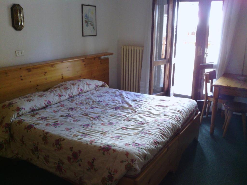Postel nebo postele na pokoji v ubytování Hotel Savoia Debili