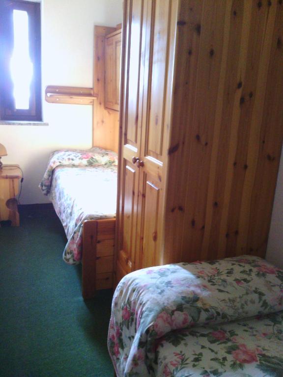 Postel nebo postele na pokoji v ubytování Hotel Savoia Debili