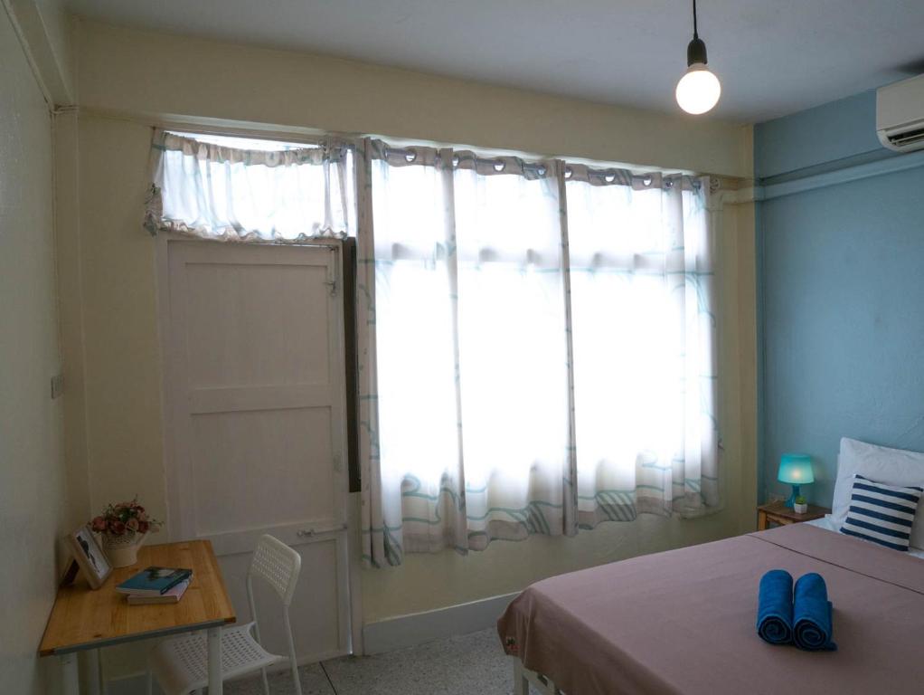 Postel nebo postele na pokoji v ubytování Chan Cha La 99 Hostel