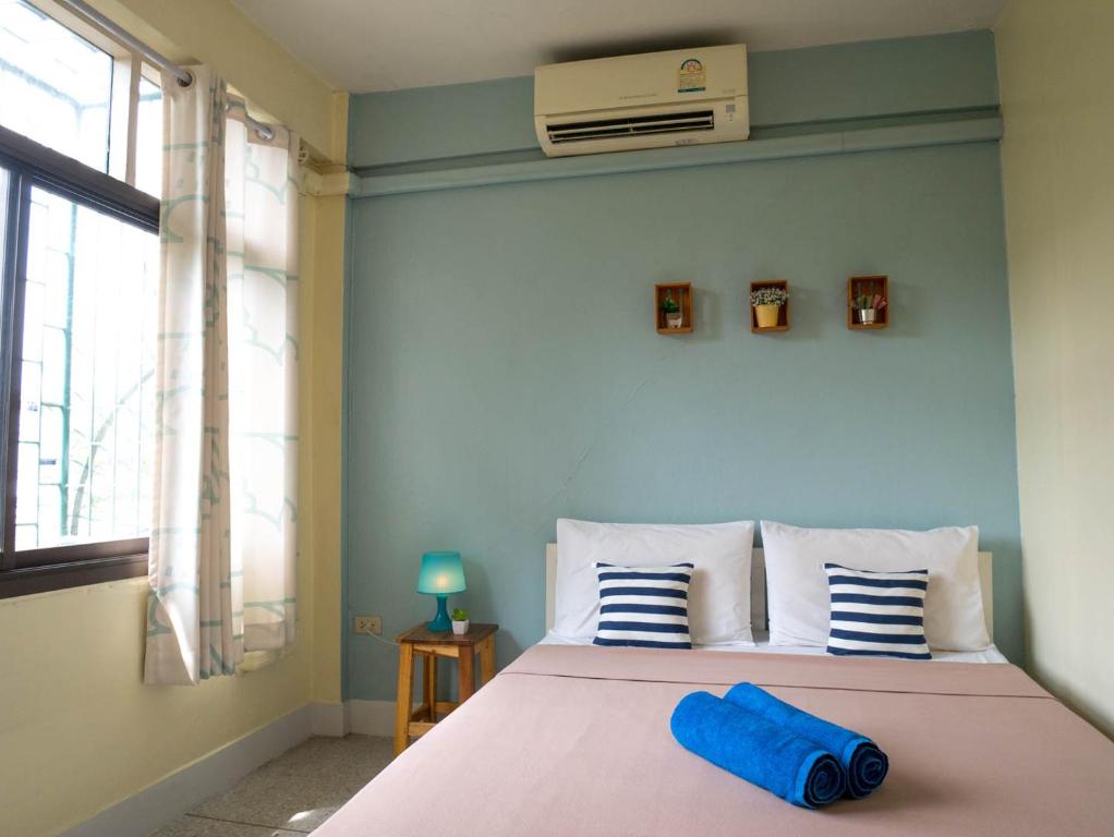 Postel nebo postele na pokoji v ubytování Chan Cha La 99 Hostel