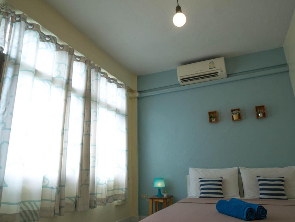 Postel nebo postele na pokoji v ubytování Chan Cha La 99 Hostel