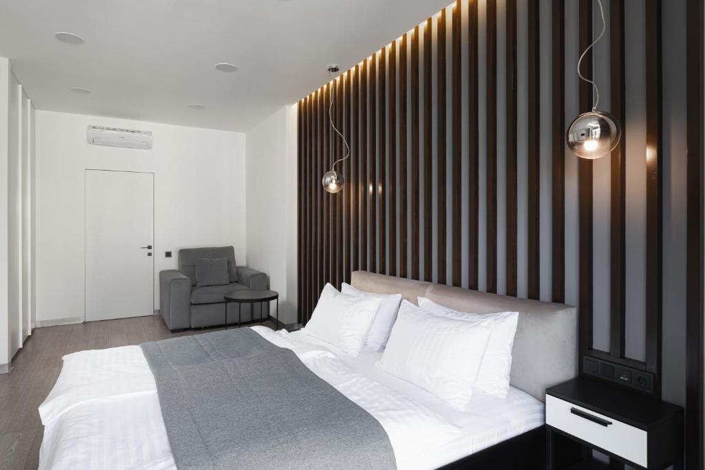 Postel nebo postele na pokoji v ubytování Beskyd Suites