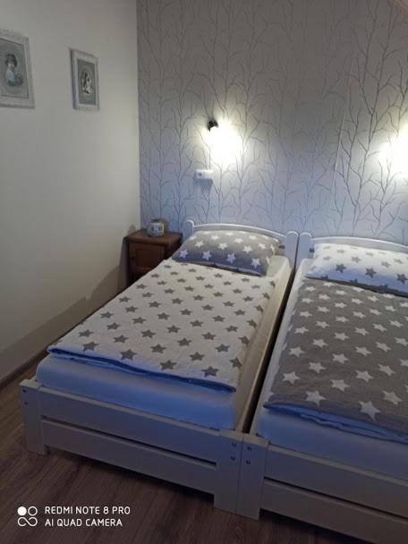 Postel nebo postele na pokoji v ubytování Sklípek u Svobodů
