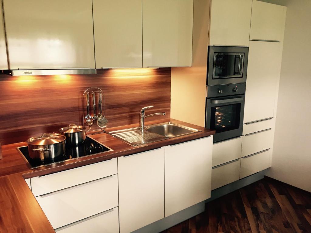 Kuchyň nebo kuchyňský kout v ubytování Das Ferienhaus