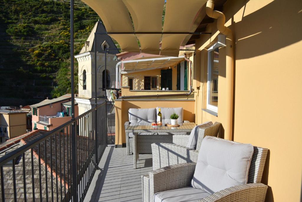 Balkón nebo terasa v ubytování L' Attico GIALLO ORO di Giulia