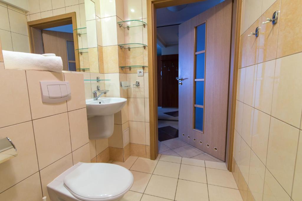 Kúpeľňa v ubytovaní Krynica Apartamenty Centrum Deptak 45