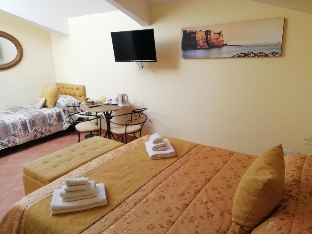 Postel nebo postele na pokoji v ubytování La Gemma