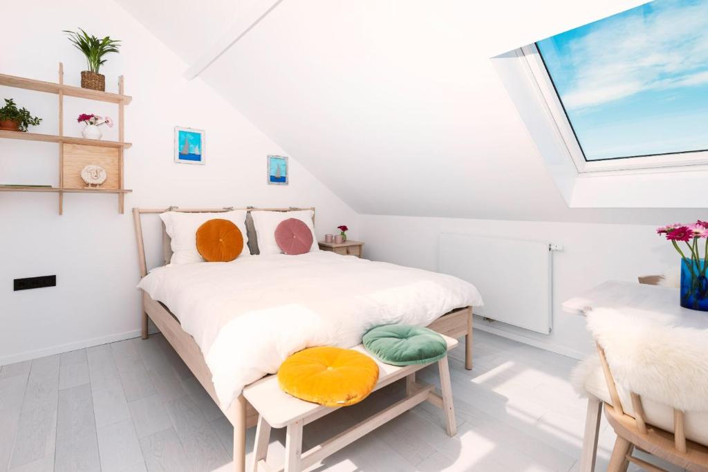 Postel nebo postele na pokoji v ubytování B&B Duinblick