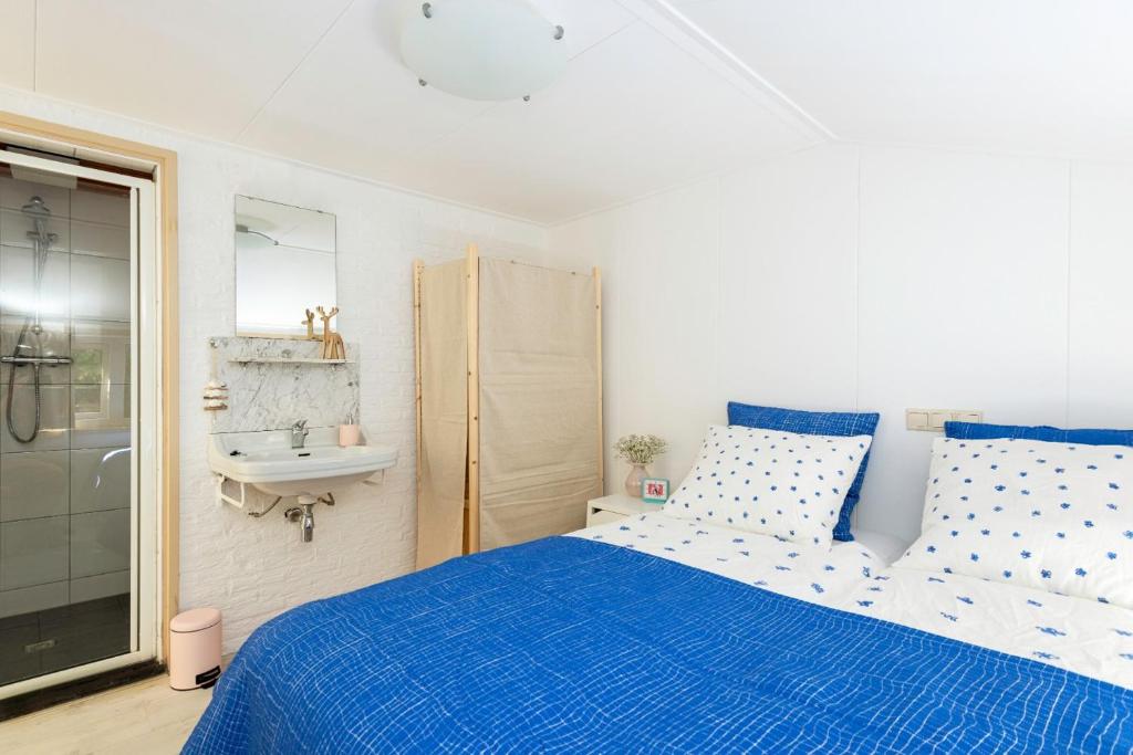 Postel nebo postele na pokoji v ubytování B&B Duinblick