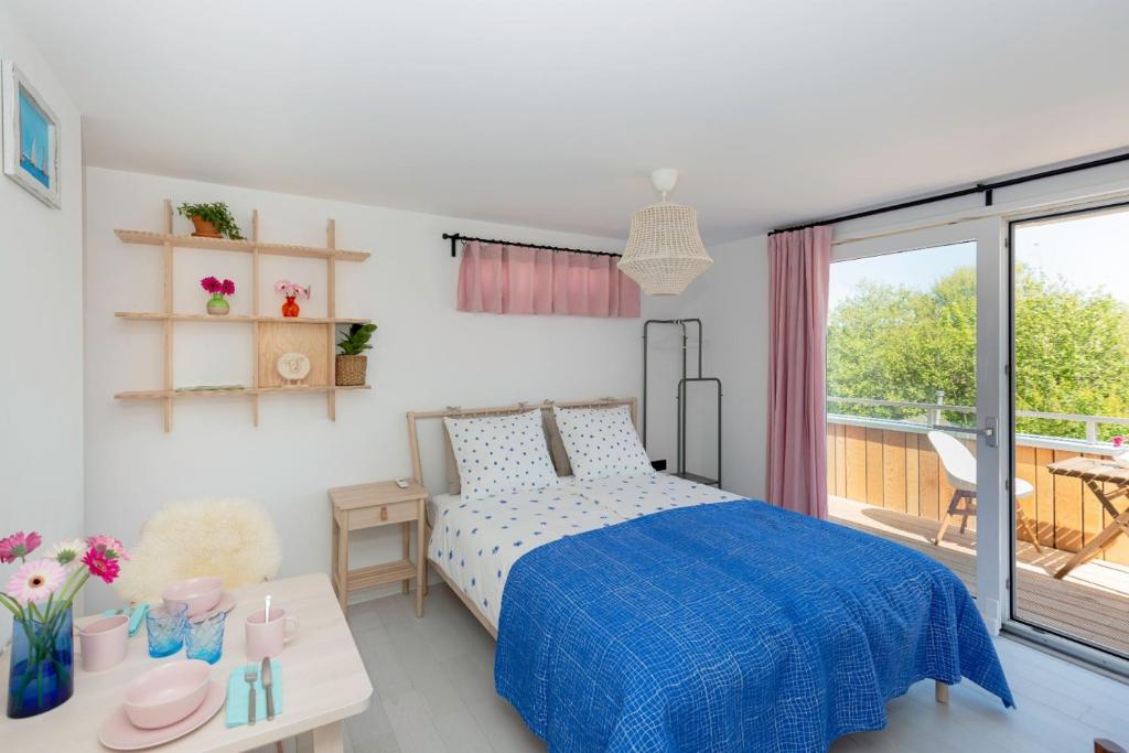 Postel nebo postele na pokoji v ubytování B&B Duinblick