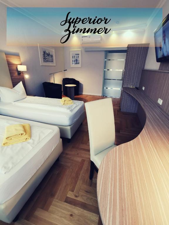 Postel nebo postele na pokoji v ubytování Hotel Goldener Anker