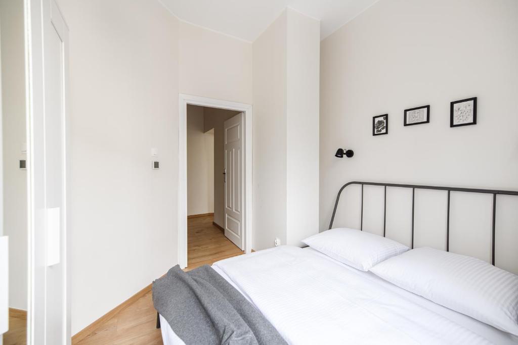 Posteľ alebo postele v izbe v ubytovaní Native Apartments Żuławskiego 8
