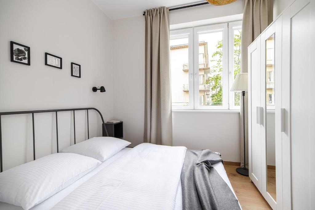 Posteľ alebo postele v izbe v ubytovaní Native Apartments Żuławskiego 8