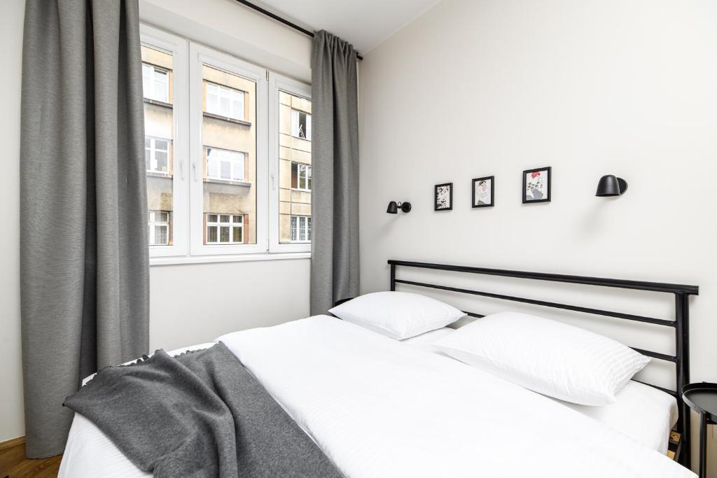 Posteľ alebo postele v izbe v ubytovaní Native Apartments Żuławskiego 8