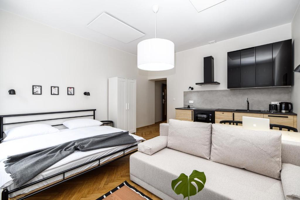 Posteľ alebo postele v izbe v ubytovaní Native Apartments Żuławskiego 8