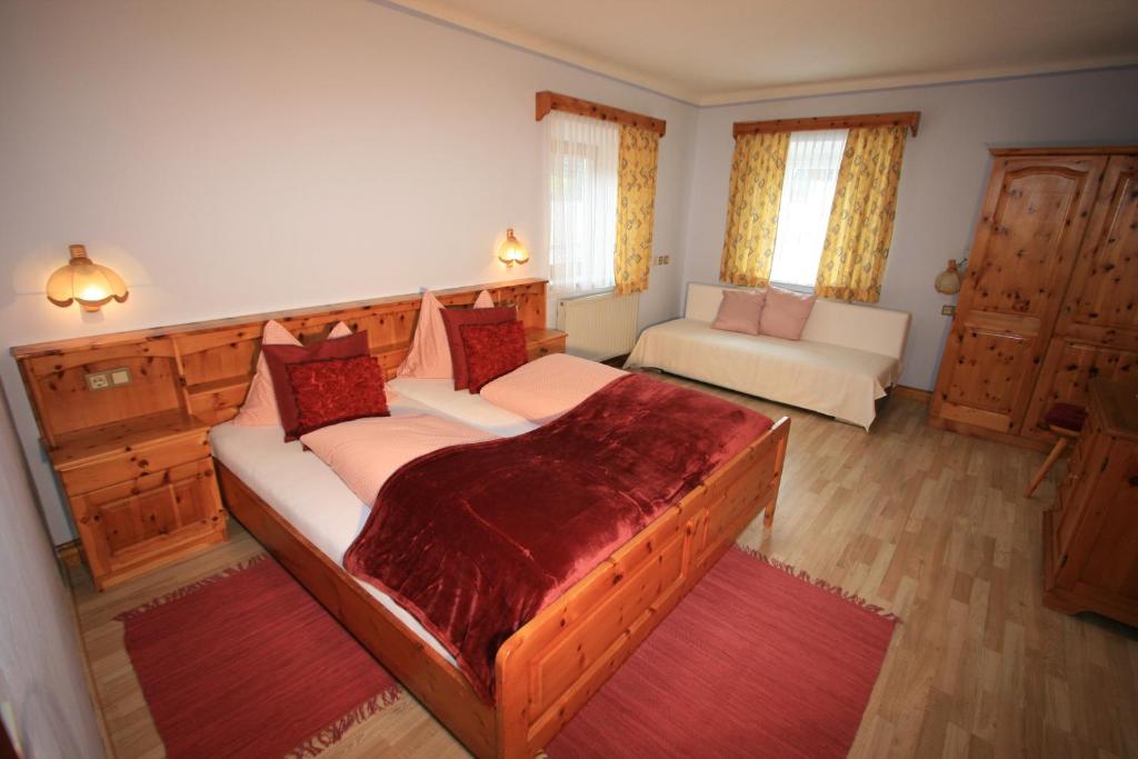 Postel nebo postele na pokoji v ubytování Hotel Stadlwirt