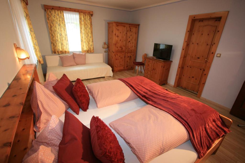 Postel nebo postele na pokoji v ubytování Hotel Stadlwirt