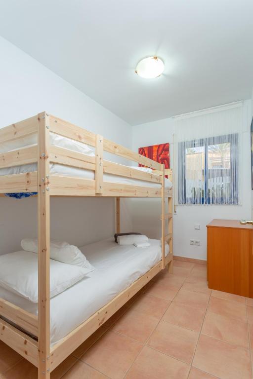 Postel nebo postele na pokoji v ubytování Villa Mariposas