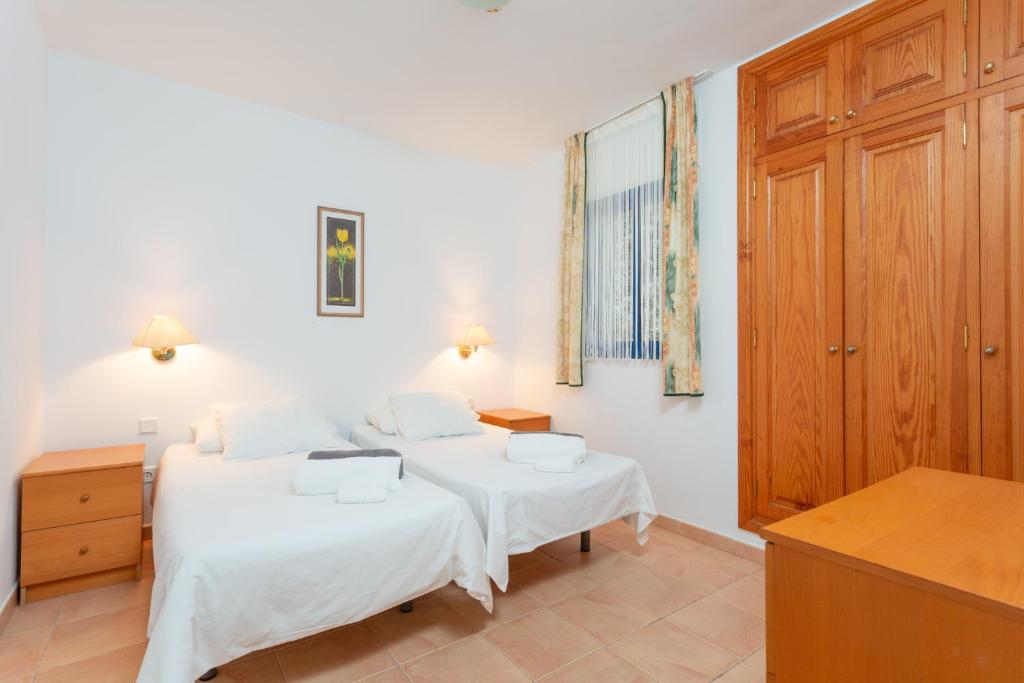 Postel nebo postele na pokoji v ubytování Villa Mariposas